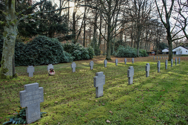 Photograph of Sandweiler German War Cemetery with small wreath.